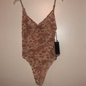 nude pink floral body suit